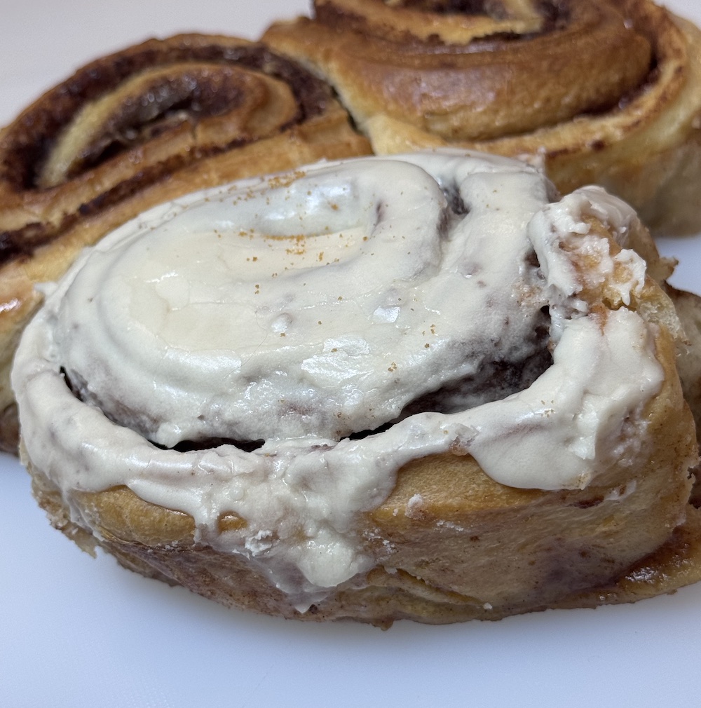 Jumbo sourdough cinnamon bun with classic butter frosting